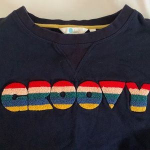 Boden sweatshirt navy with GROOVY in multicolored yarn. XS.